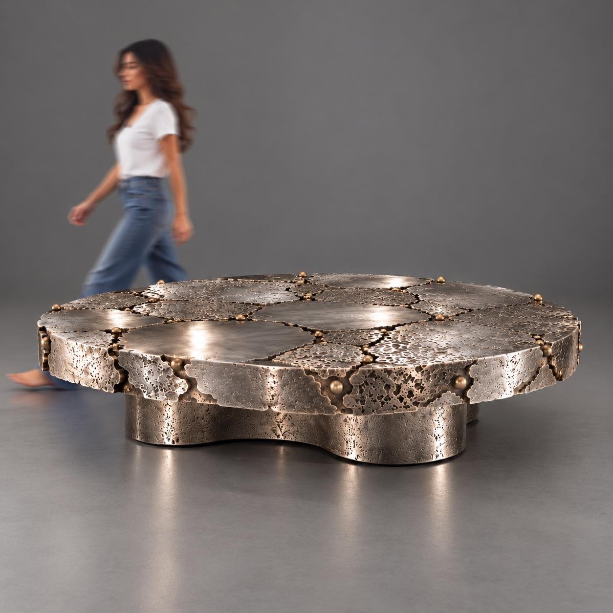 FRAGMENT — sculptural coffee table with scale reference